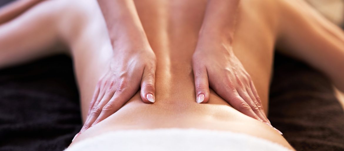 relaxed-woman-receiving-back-massage-2023-11-27-05-32-20-utc