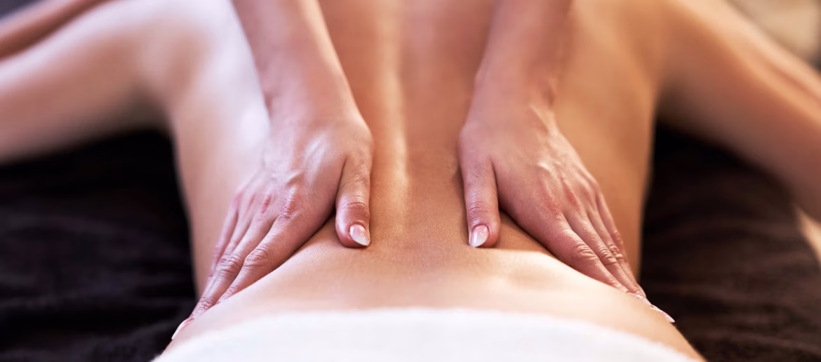 relaxed-woman-receiving-back-massage-2023-11-27-05-32-20-utc