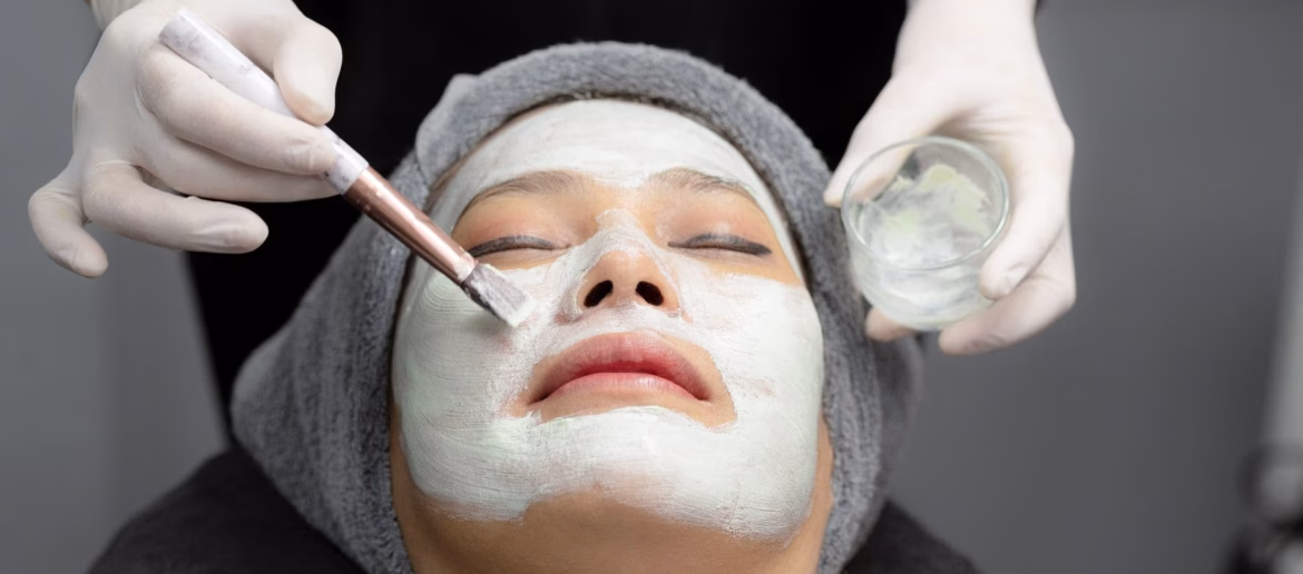 young-woman-cream-mask-facial-in-beauty-clinic-2023-11-27-05-18-35-utc